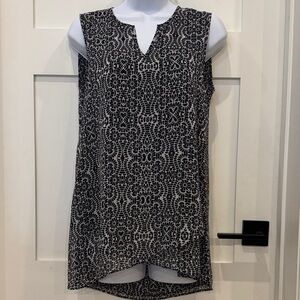 Elegant Black and White Sleeveless Blouse